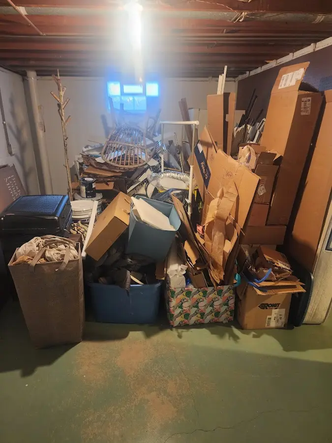 Roll-off dumpster container at job site for Concrete Dumpster Rental in Oak Park Heights